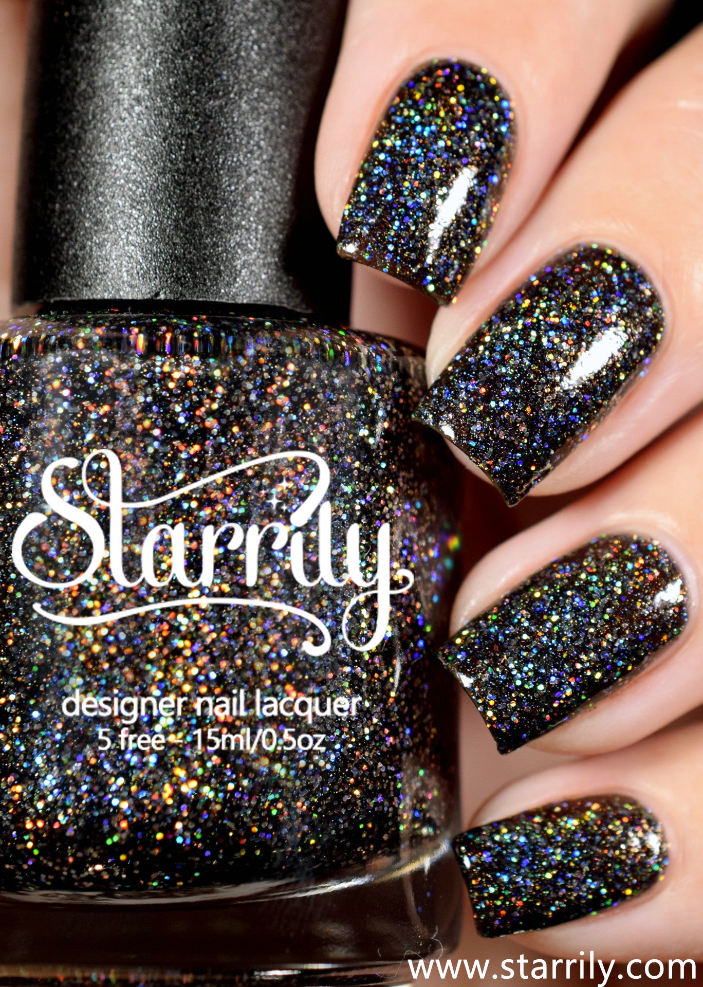 Beautiful blackened gray holo nail polish with holographic glitter