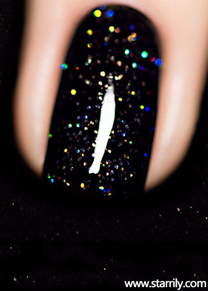 Neutrino is a jet black nail polish with bright silver holographic glitter