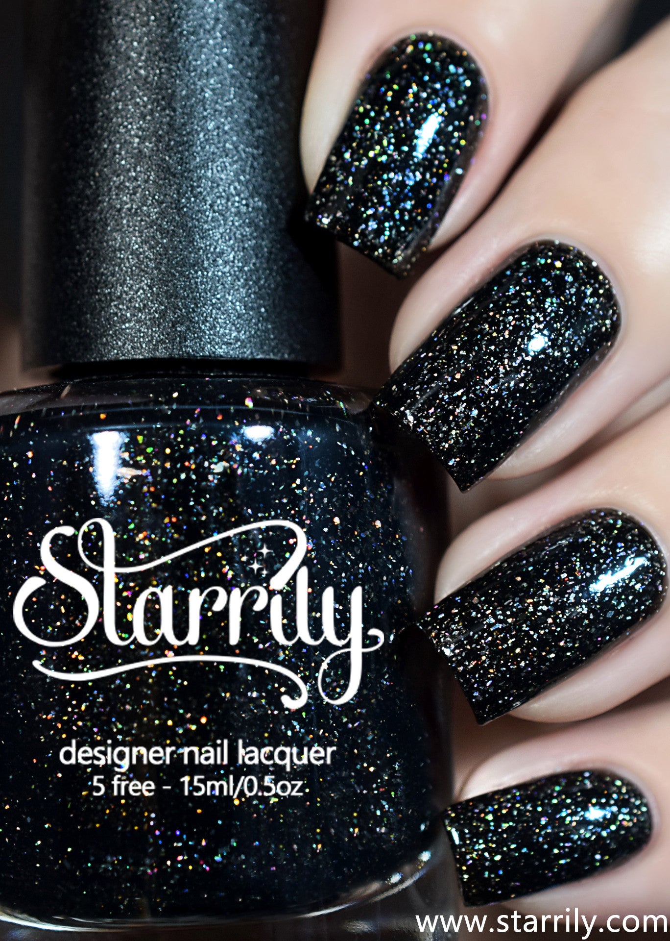 Starrily Adrenaline - Gorgeous jet black nail polish with dazzling silver holographic flakes. High quality nail polish. Made in the USA! Cruelty Free and Vegan.