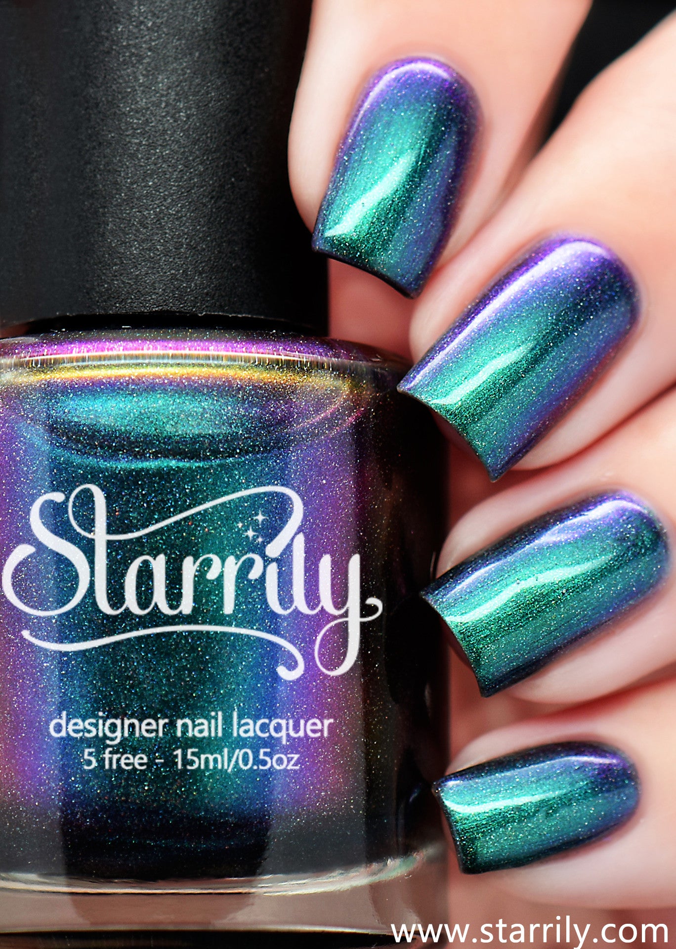 Starrily Aurora - Jaw dropping green to purple color changing holographic multi chrome. High quality nail polish. Made in the USA! Cruelty Free and Vegan.