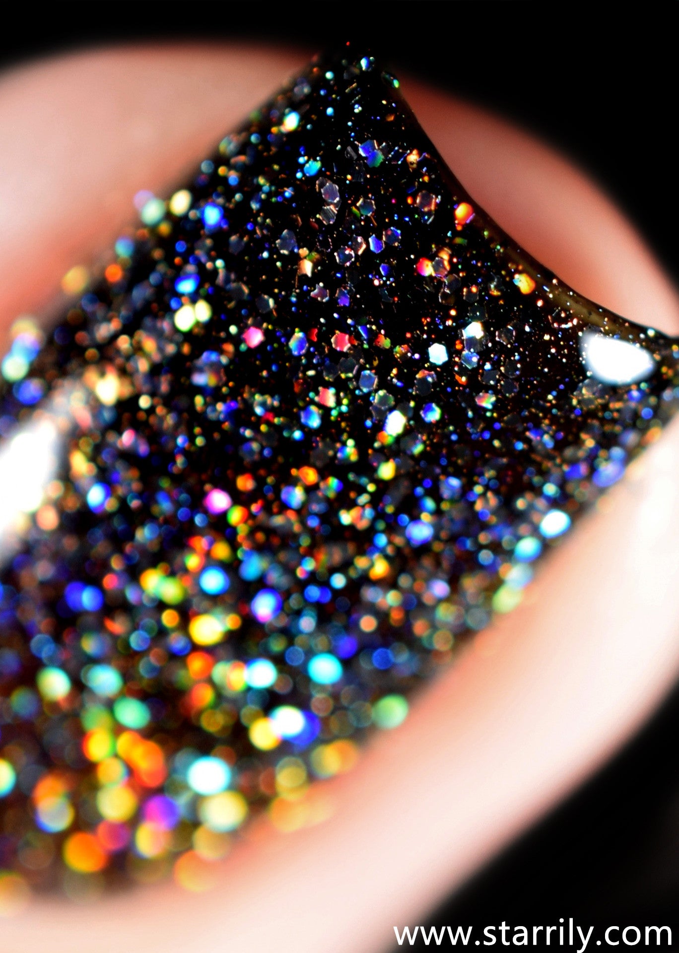 Beautiful blackened gray holo nail polish with holographic glitter