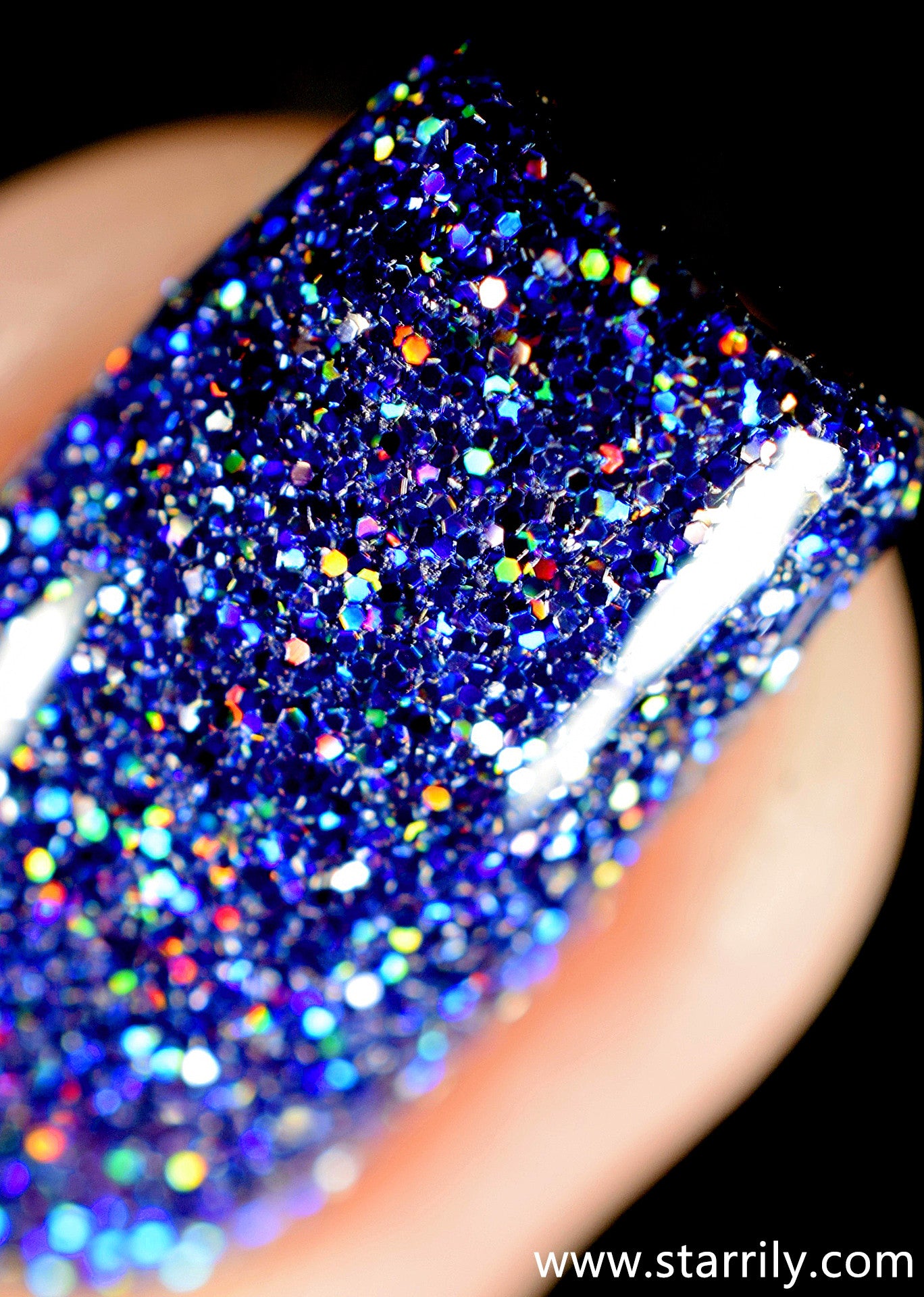 Orions Belt is a stunning nail polish containing sparkling purple holographic glitter